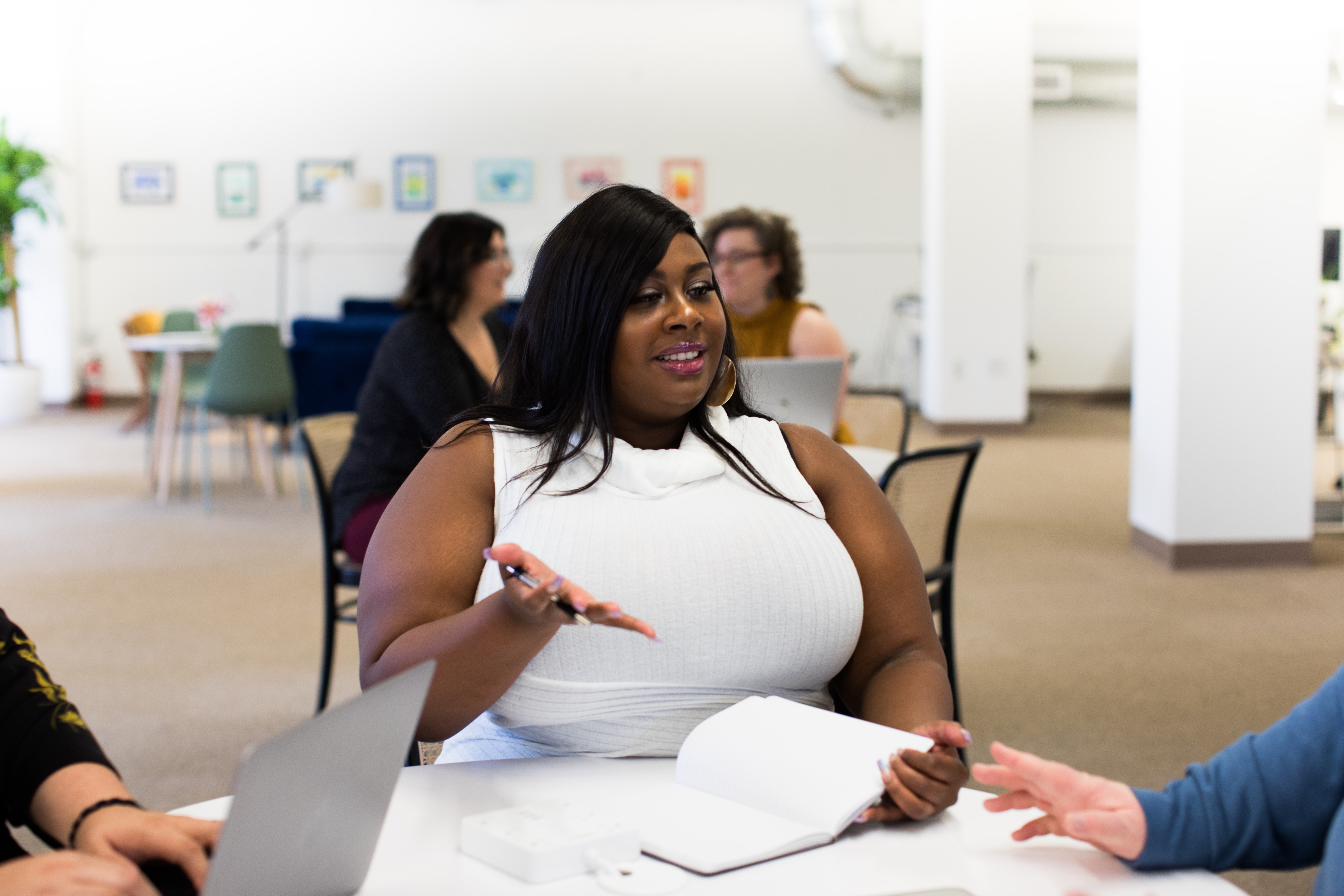 A Black woman professional — Women Beyond Limits.